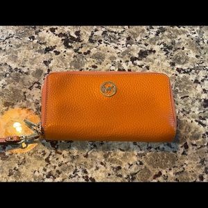 Michael Kors Orange Full Zip Around Wristlet